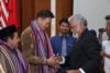 A warm embrace between Mr. Xanana and Mr. Chong