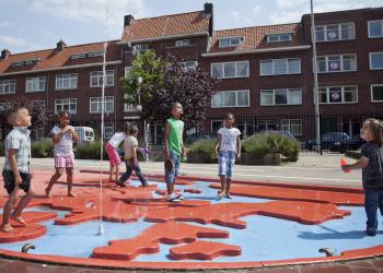 Youth enjoy important community social spaces in Tarwewijk, a neighborhood in Rotterdam city, The Netherlands