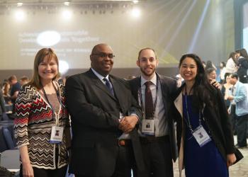The Baha’i International Community’s delegation to the 66th UN DPI/NGO Conference consisted of (left to right) Lori Noguchi, Carl Murrell, Daniel Perell, and Saphira Rameshfar.