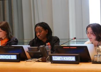  BIC delegates Alphonsine Sefu and Lizzy Moshirian speaking at an event on youth 