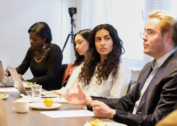 Participants at the roundtable discussions talking about the role of youth in fostering social cohesion